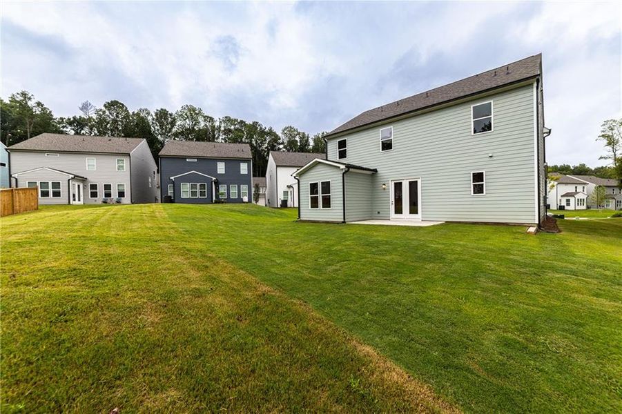 Front exterior of a new home in , Canton, GA, highlighting curb appeal (Image 1).