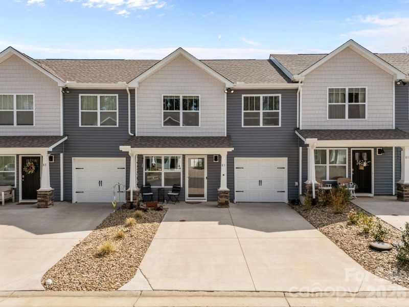 Front exterior of a new home in , Candler, NC, highlighting curb appeal (Image 1). Front exterior of a new home in , Candler, NC, highlighting curb appeal (Image 1).