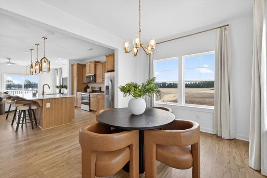 Representative furnished interior of a home built from the Hollis TH by True Homes in North District at Flowers Plantation Townhomes, Clayton (Image 6).