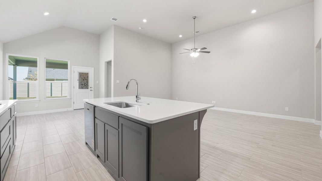 Representative furnished interior of a home built from the BASSWOOD by D.R. Horton in Treeline, Justin (Image 13).