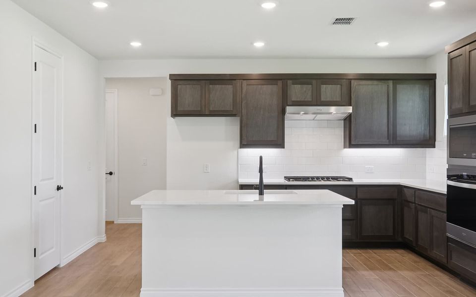 Furnished interior view inside a new home in Cottage at Kissing Tree, San Marcos (Image 6). Furnished interior view inside a new home in Cottage at Kissing Tree, San Marcos (Image 6).