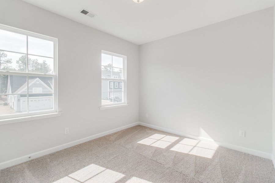Spacious, unfurnished interior of a new home in Pebble Branch, Chapin (Image 39).
