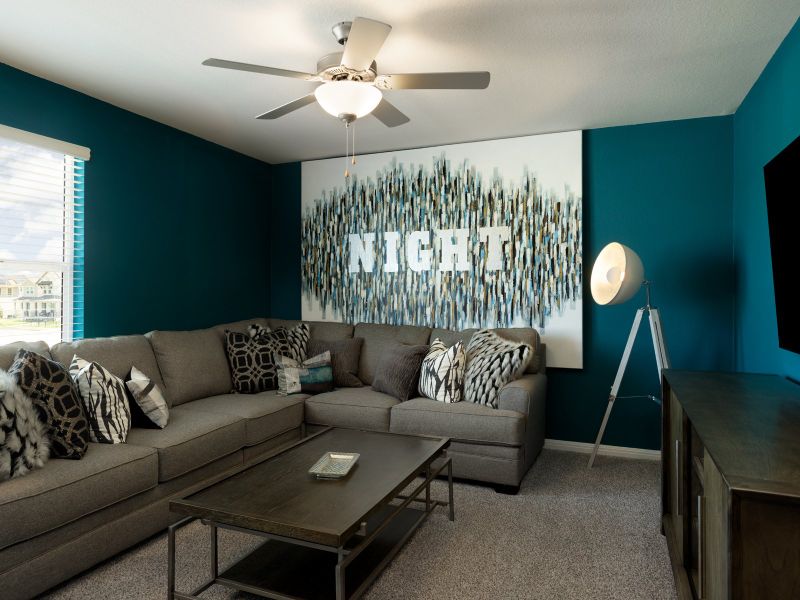 Turn one of the bedrooms into the perfect spot for family movie nights.