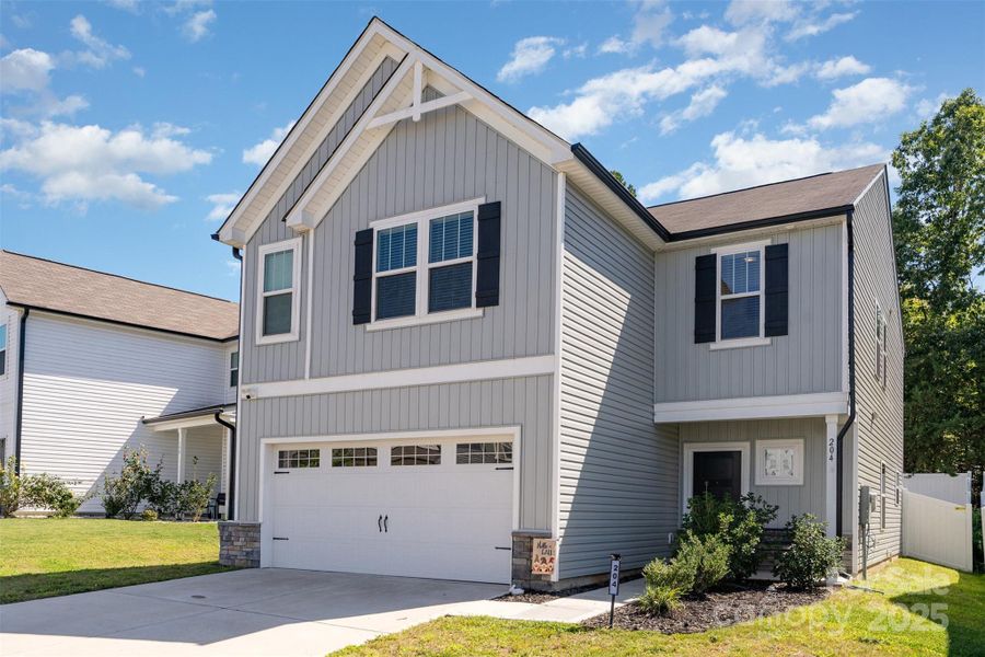 Front exterior of a new home in Shay Crossing, Salisbury, NC, highlighting curb appeal (Image 17). Front exterior of a new home in Shay Crossing, Salisbury, NC, highlighting curb appeal (Image 17).