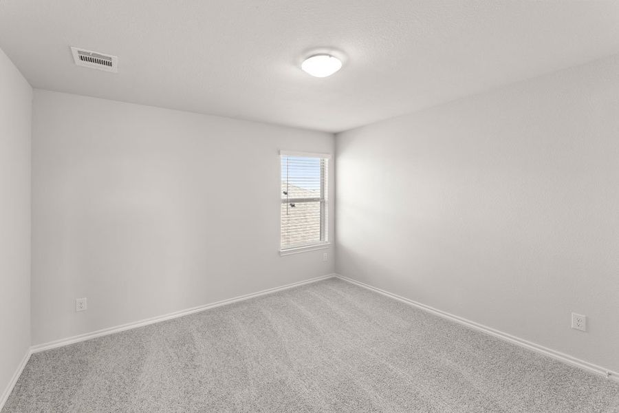 Front exterior of a new home in Creekside Ranch, Blue Ridge, TX, highlighting curb appeal (Image 14).