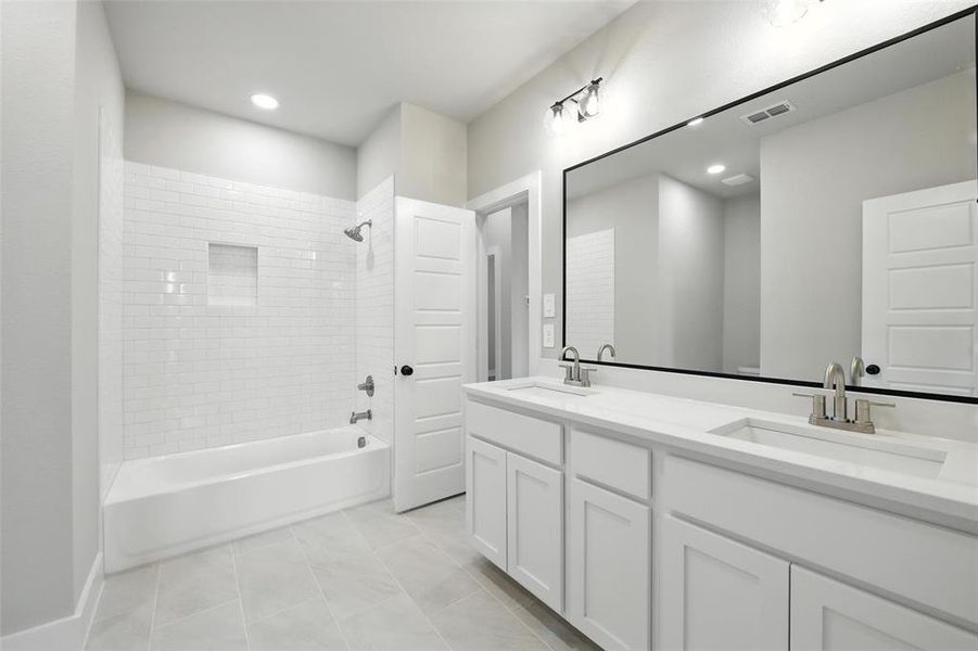 Full bath with double vanity and washtub / shower combination Full bath with double vanity and washtub / shower combination