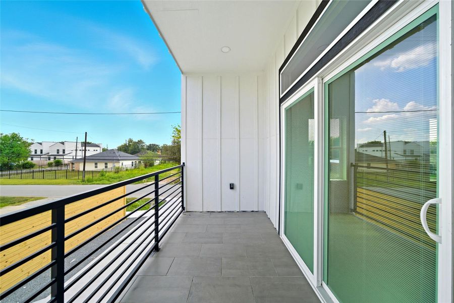 Exterior details and patio area of a home in , Houston (Image 3).