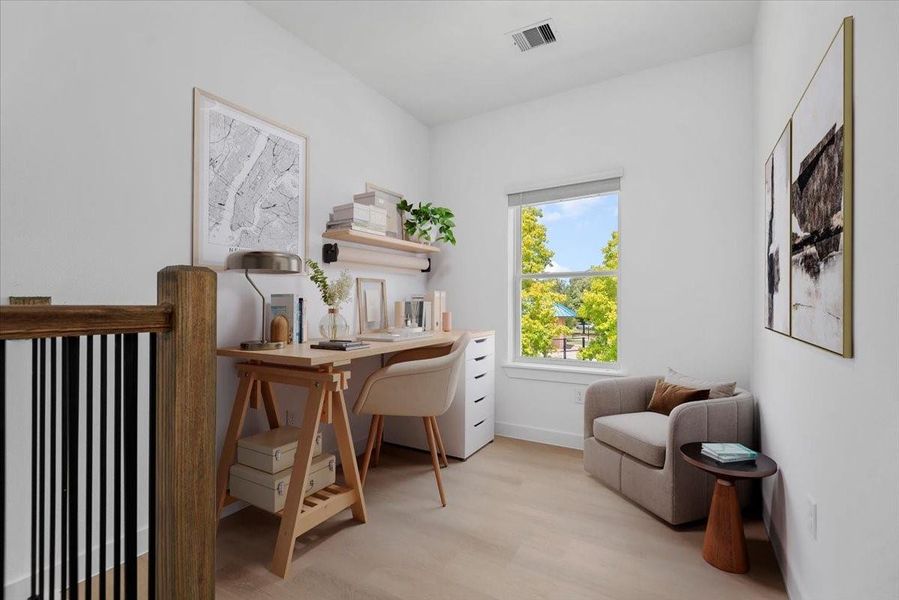 Staged - Light-filled office/den with direct views of the park and dog park across the street Staged - Light-filled office/den with direct views of the park and dog park across the street