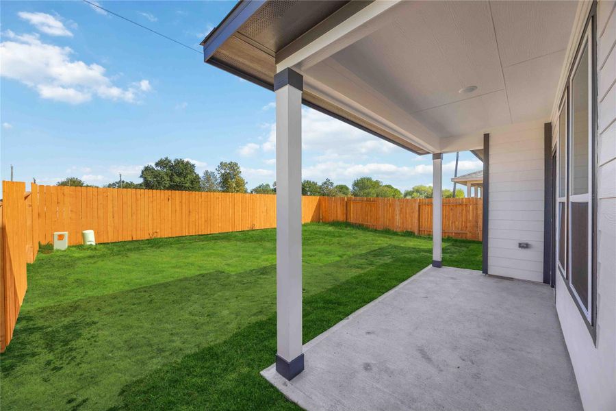 Exterior details and patio area of a home in Tejas Village, Beasley (Image 3).