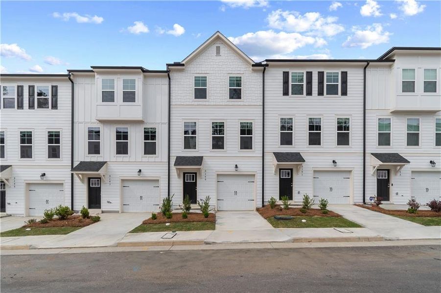 Front exterior of a new home in Monticello, Atlanta, GA, highlighting curb appeal (Image 1). Front exterior of a new home in Monticello, Atlanta, GA, highlighting curb appeal (Image 1).