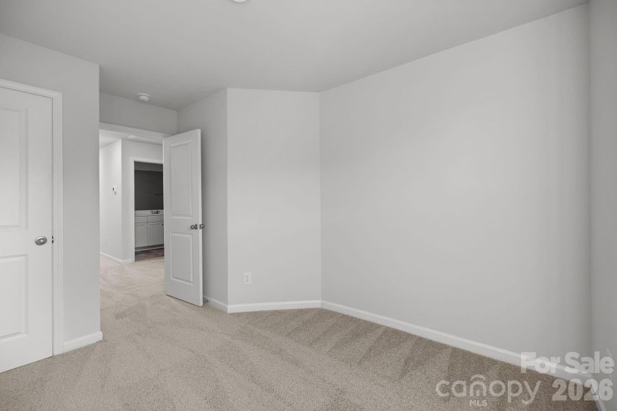 Spacious, unfurnished interior of a new home in Townes at Ribbon Walk, Charlotte (Image 13).