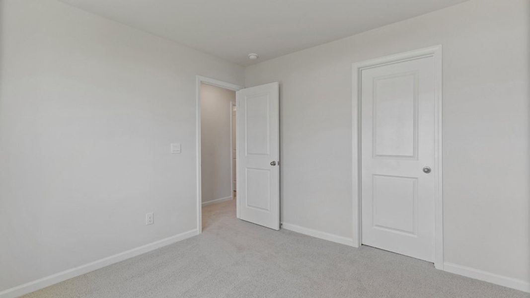Spacious, unfurnished interior of a new home in Copper Run South, Durham (Image 18).