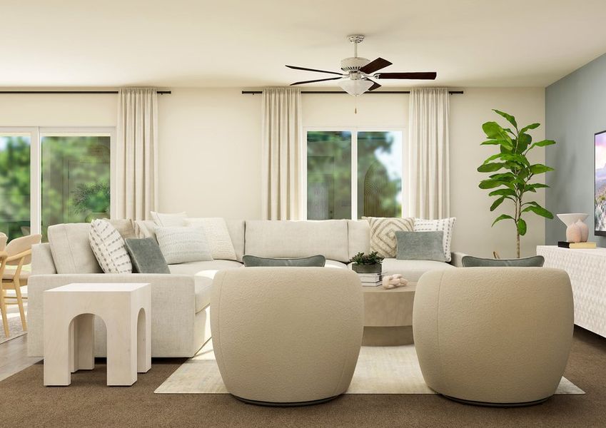 Rendering of the living room furnished with a large white couch and two white side chairs. Rendering of the living room furnished with a large white couch and two white side chairs.