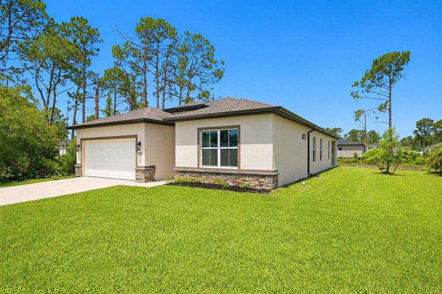 Front exterior of a new home in , North Port, FL, highlighting curb appeal (Image 22).