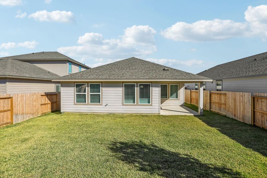 Exterior details and patio area of a home in Pine Lake Cove - Premier Series, Montgomery (Image 24).