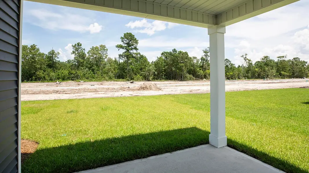 Exterior details and patio area of a home in Saltgrass Landing, Winnabow (Image 2). Exterior details and patio area of a home in Saltgrass Landing, Winnabow (Image 2).