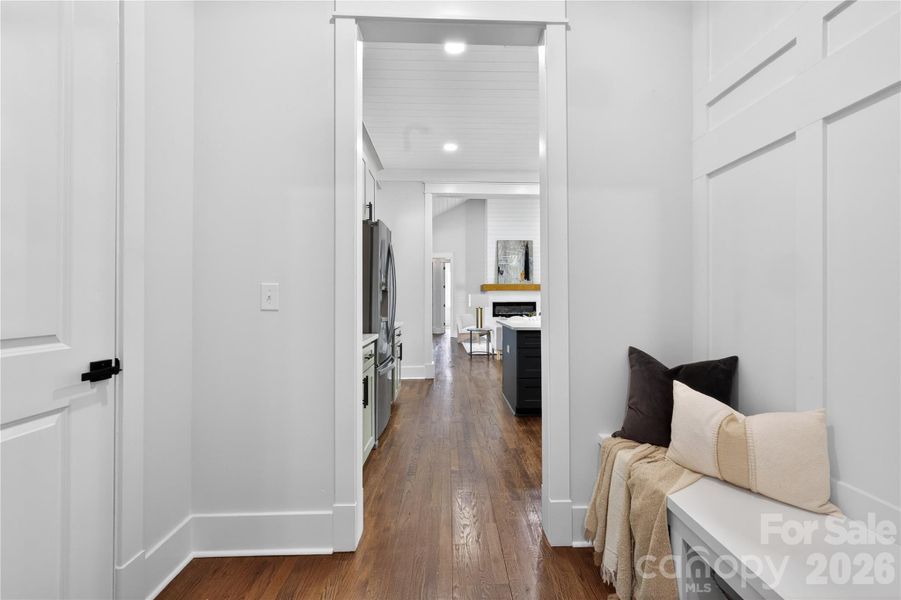 A built-in drop zone with bench seating creates the perfect spot to kick off your shoes, drop your bags, and finally relax when you get home