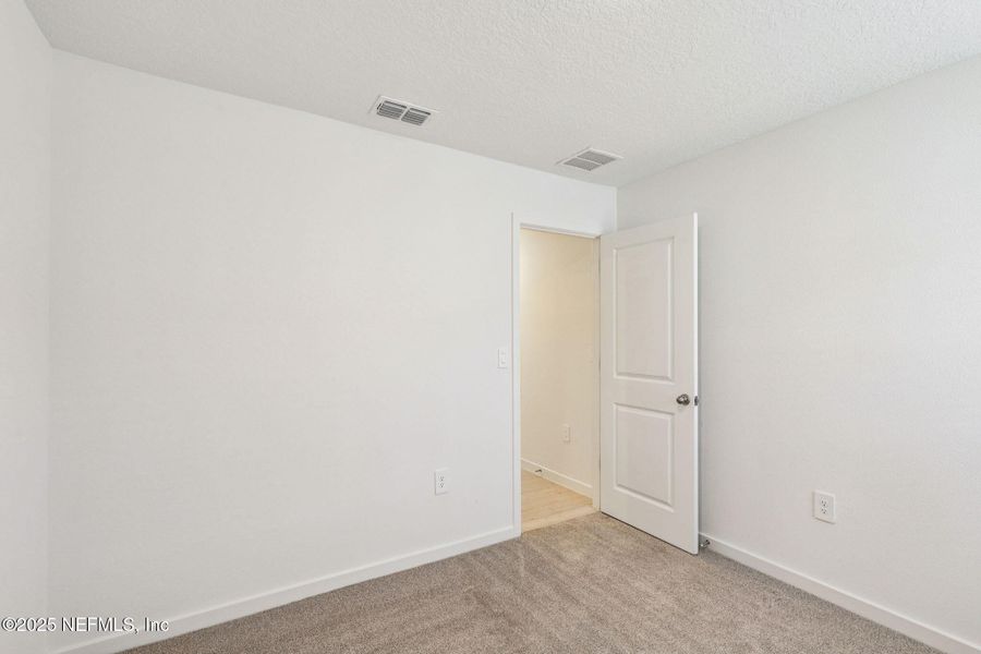 Spacious, unfurnished interior of a new home in Cypress Meadows - Signature Series, Jacksonville (Image 16).