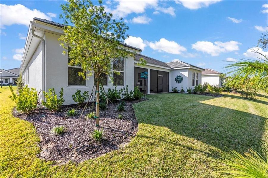 Exterior details and patio area of a home in Windchase at Halifax Plantation, Ormond Beach (Image 2). Exterior details and patio area of a home in Windchase at Halifax Plantation, Ormond Beach (Image 2).