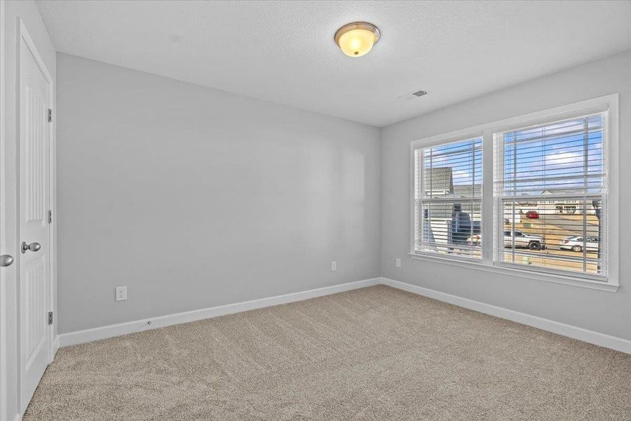 Spacious, unfurnished interior of a new home in Zanes Creek, Inman (Image 24).