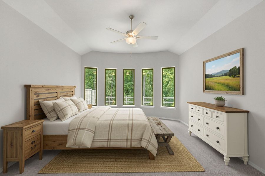 The primary bedroom features a bay window with outstanding views of the natural landscape behind. Virtually staged.