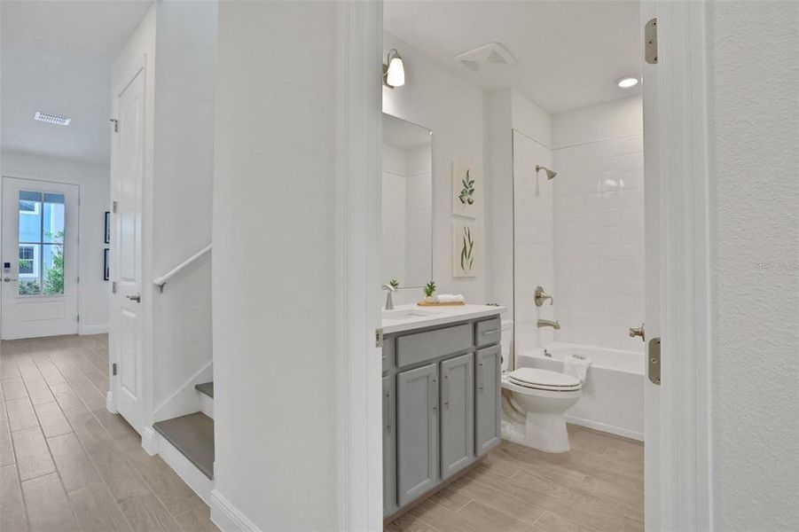 Furnished interior view inside a new home in Bungalow Walk at Lakewood Ranch, Sarasota (Image 10).