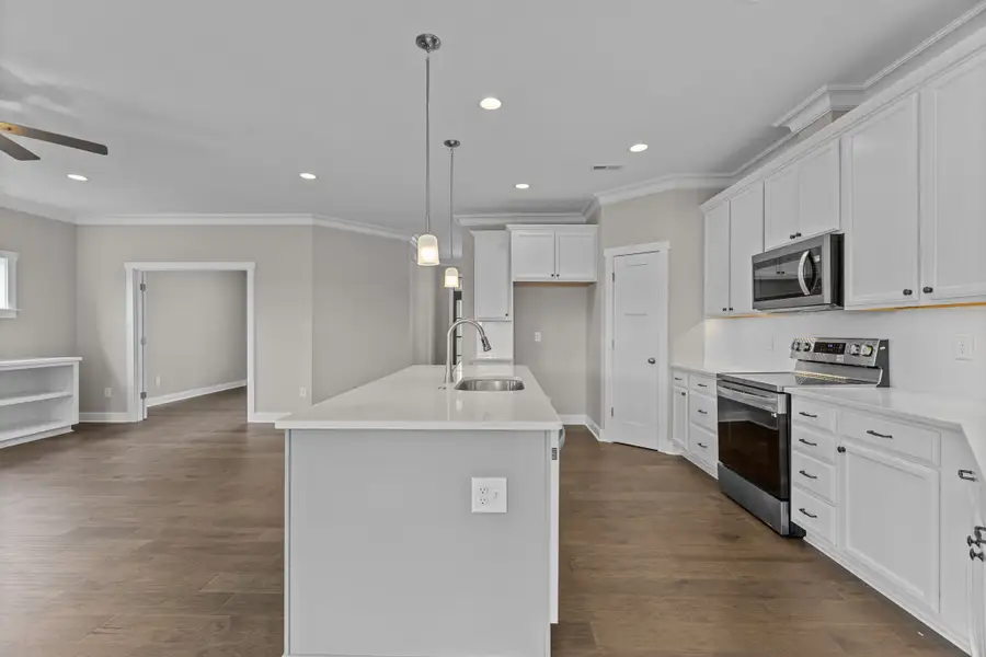 Furnished interior in a model home at Cheshire Landing in Grimesland (Image 14).