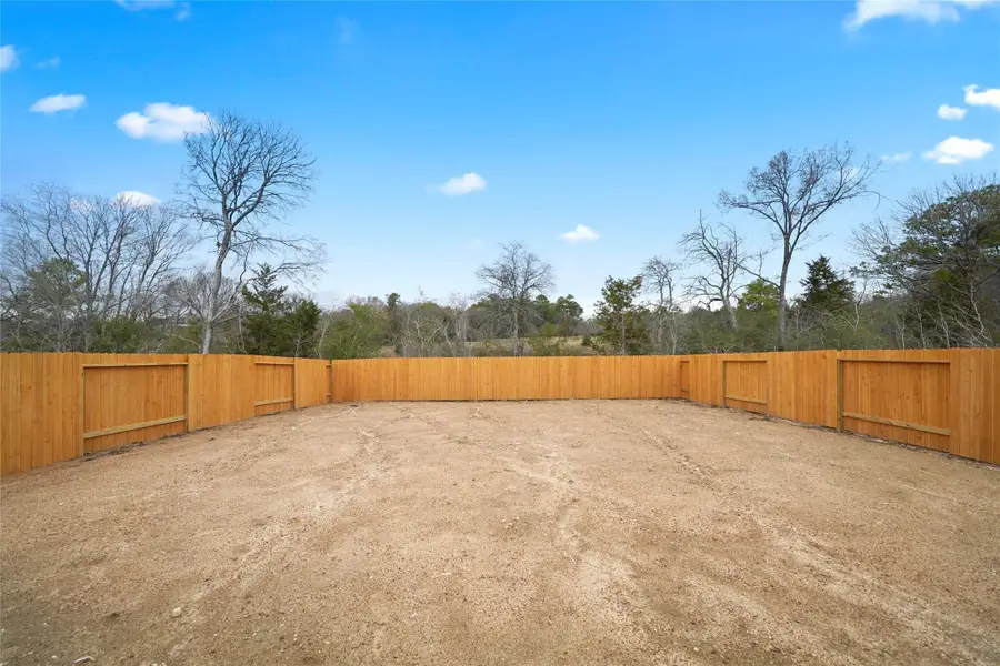 Exterior details and patio area of a home in Lexington Heights, Willis (Image 3).