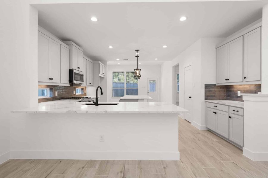 Furnished interior view inside a new home in Wood Leaf Reserve, Tomball (Image 14).