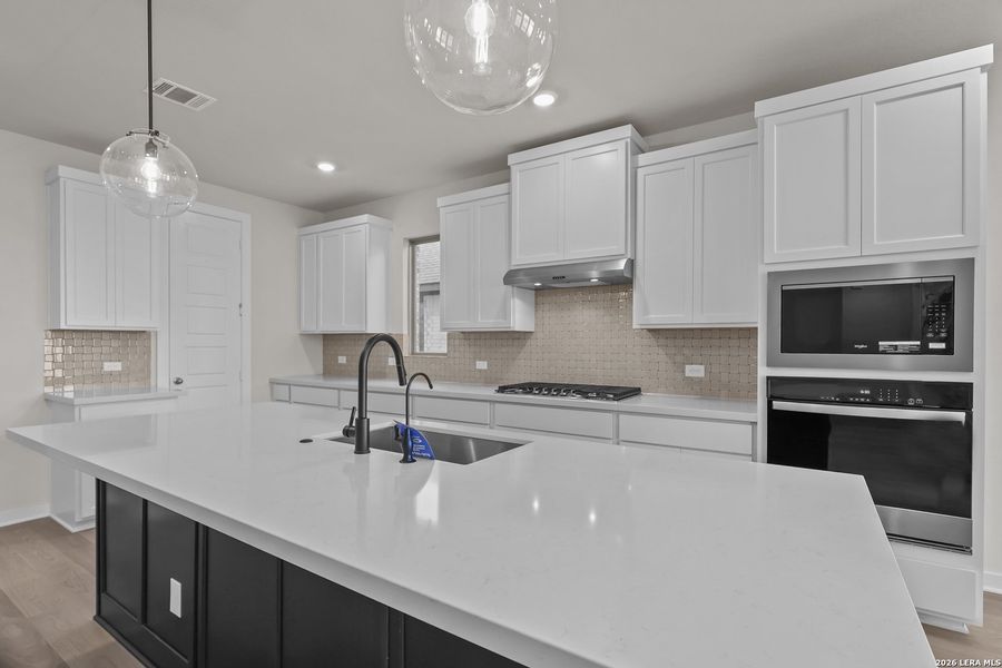 Furnished interior view inside a new home in Nopal Valley, San Antonio (Image 15).