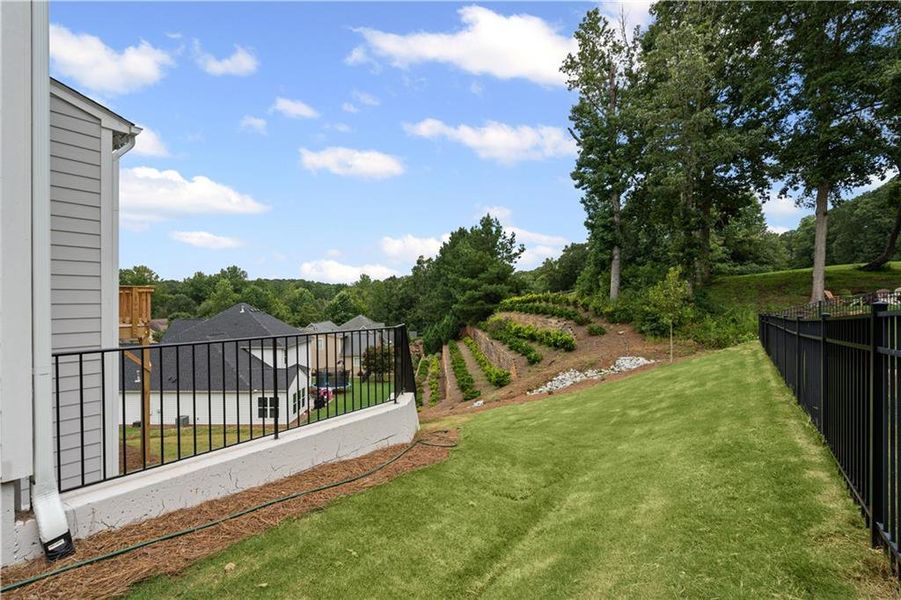 Front exterior of a new home in Reunion, Hoschton, GA, highlighting curb appeal (Image 20).
