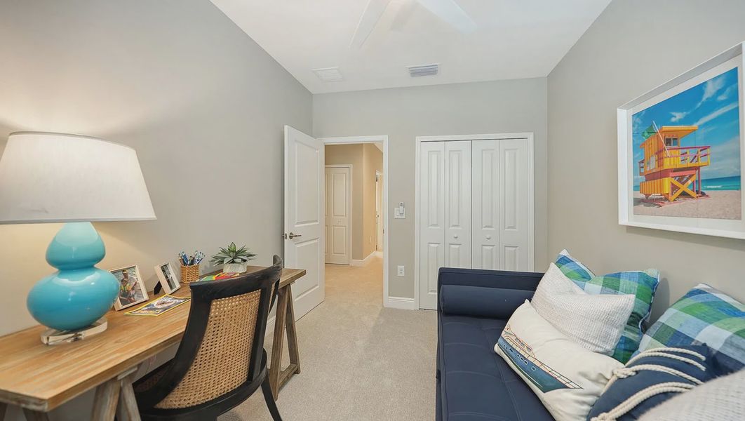 Representative furnished interior of a home built from the Avery by Neal Communities in SkySail, Naples (Image 7).