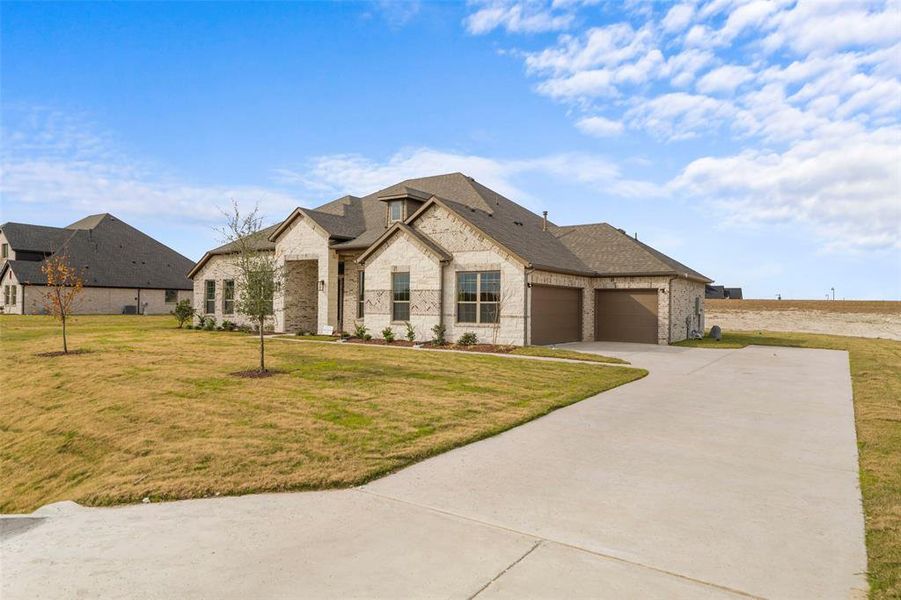Front exterior of a new home in , Waxahachie, TX, highlighting curb appeal (Image 12).