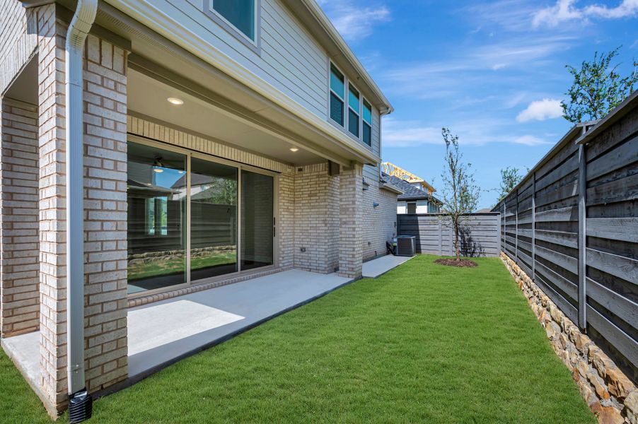 Exterior details and patio area of a home in Union Park, Little Elm (Image 2). Exterior details and patio area of a home in Union Park, Little Elm (Image 2).