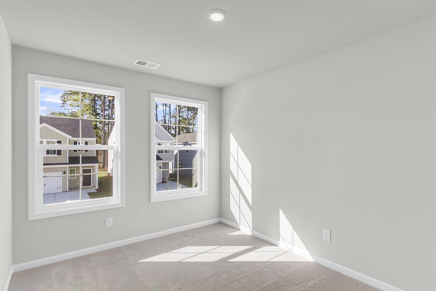 Spacious, unfurnished interior of a new home in Central Creek, Goose Creek (Image 25).