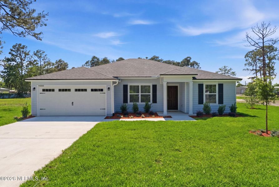 Front exterior of a new home in , Jacksonville, FL, highlighting curb appeal (Image 1). Front exterior of a new home in , Jacksonville, FL, highlighting curb appeal (Image 1).