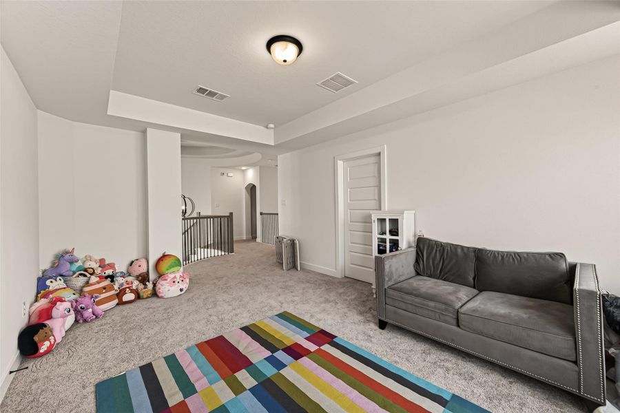 This versatile game room provides plenty of room for entertaining or relaxing. This versatile game room provides plenty of room for entertaining or relaxing.