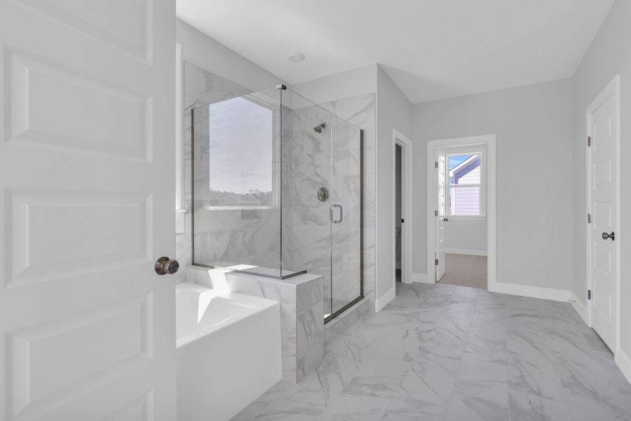 Representative furnished interior of a home built from the The Hampton by RobuckHomes in Windwater, Hampstead (Image 48).