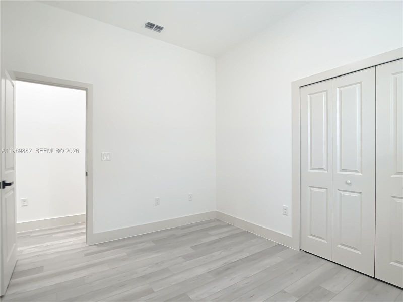 Spacious, unfurnished interior of a new home in , Port Charlotte (Image 22).