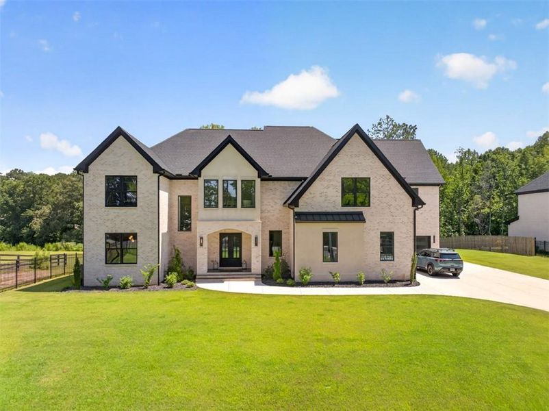 Front exterior of a new home in , Buford, GA, highlighting curb appeal (Image 32).