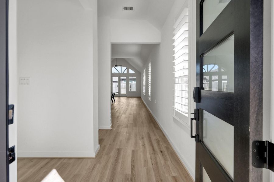 As you enter the home your are greeted by high ceilings and luxury vinyl plank throughout the living area. Plantation shutters were added throughout. Neutral flooring and paint make this home easy to decorate.