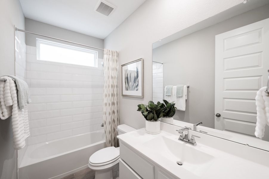 Representative furnished interior of a home built from the Verdin by Tri Pointe Homes in Pecan Ridge, Fulshear (Image 38).