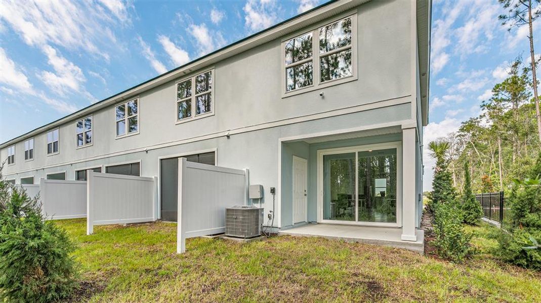 Front exterior of a new home in Stokes Landing, St. Augustine, FL, highlighting curb appeal (Image 2).