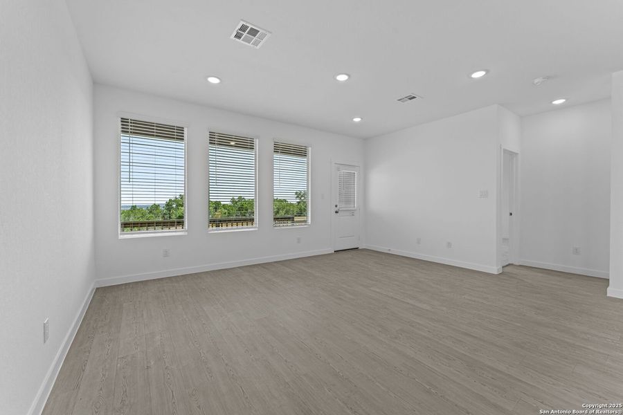 Spacious, unfurnished interior of a new home in Waterwheel: Coastline Collection, San Antonio (Image 8).