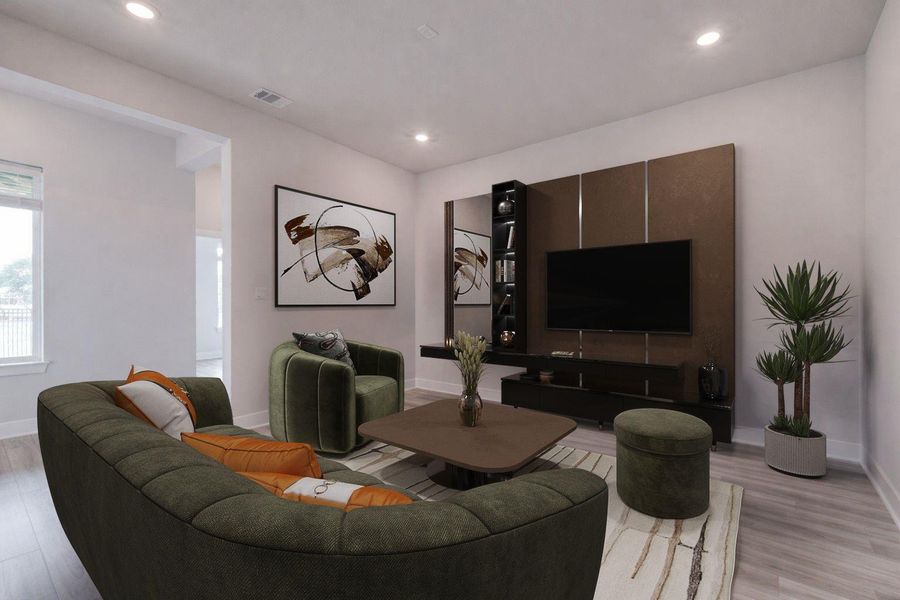 Spacious living area featuring light-colored walls and recessed lighting