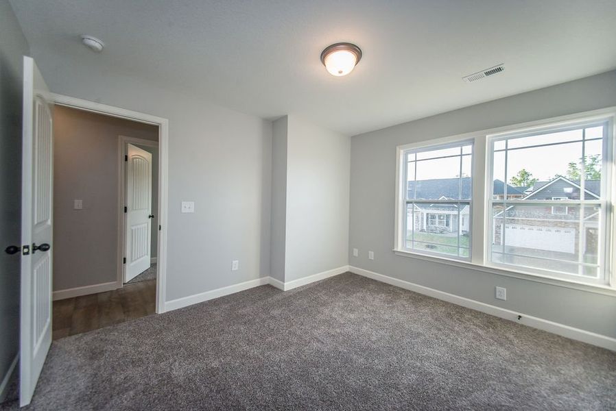 Representative unfurnished interior of a home built from the Heatherwood by Enchanted Homes in Ballentine Ridge, Lyman (Image 29).
