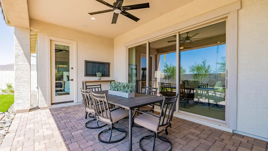 Exterior details and patio area of a home in Windrose, Waddell (Image 3).
