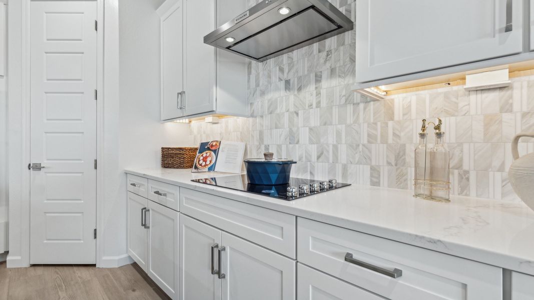 Representative furnished interior of a home built from the Miraval by D.R. Horton in The Ridge at Stone Butte, Phoenix (Image 29).