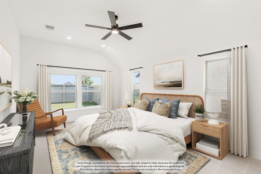 Bedroom with vaulted ceiling, ceiling fan, rattan headboard, and multiple windows with backyard view