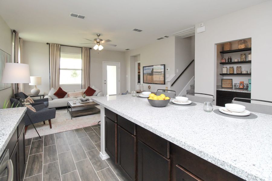 Furnished interior view inside a new home in Villas San Agustin, Laredo (Image 5).